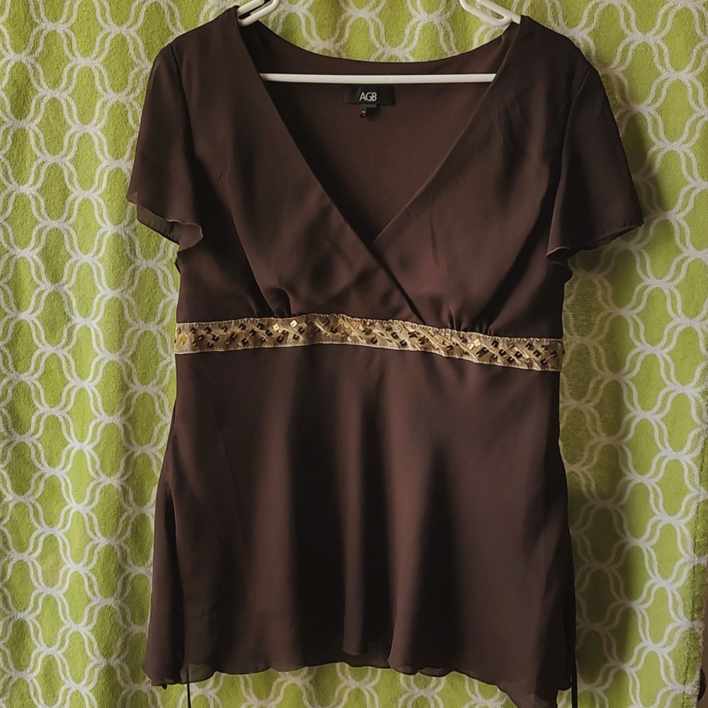 Woman's Brown tie back with gold sequin trim shirt